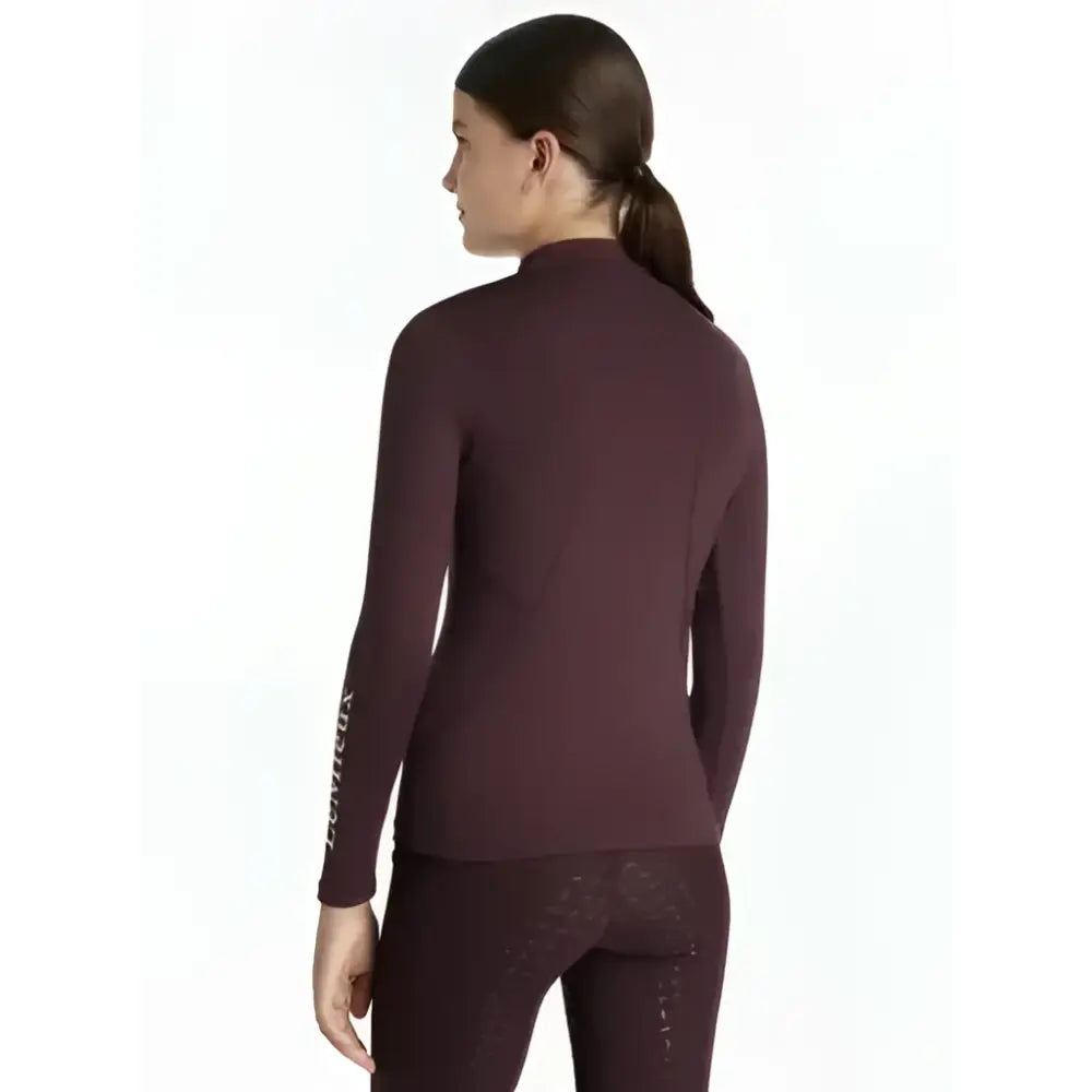 Maroon lemieux young rider classique long sleeve base layer with subtle vertical branding on left sleeve