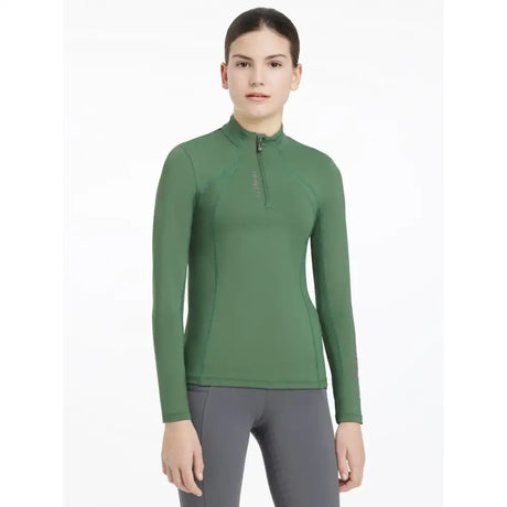 A sleek olive green lemieux young rider classique long sleeve base layer with half zip and seam detailing