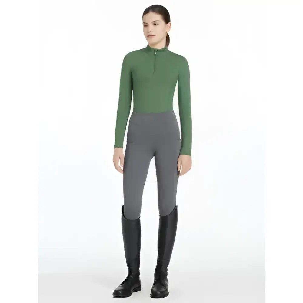 Green and gray lemieux young rider classique base layer with fitted long sleeves and matching leggings for riders