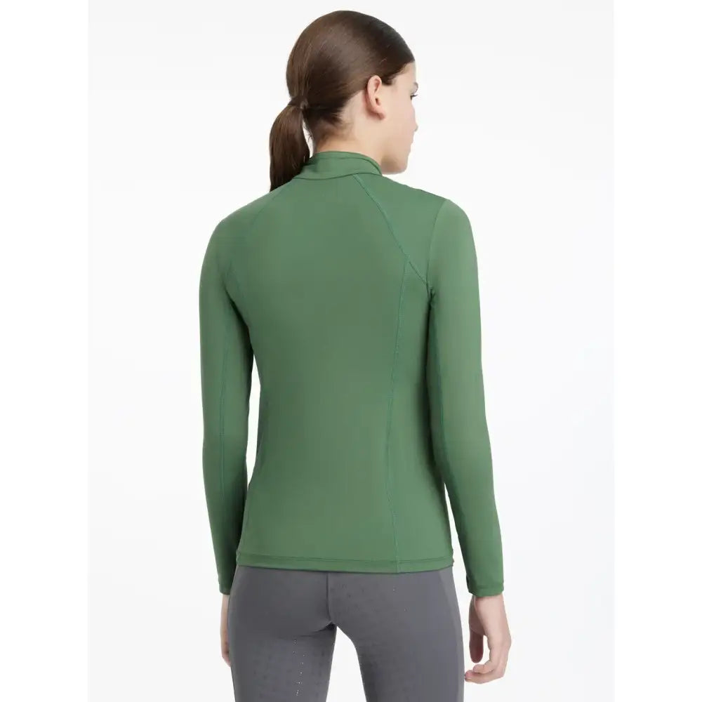 A sleek olive green lemieux young rider classique long-sleeved rider classique base layer with high collar