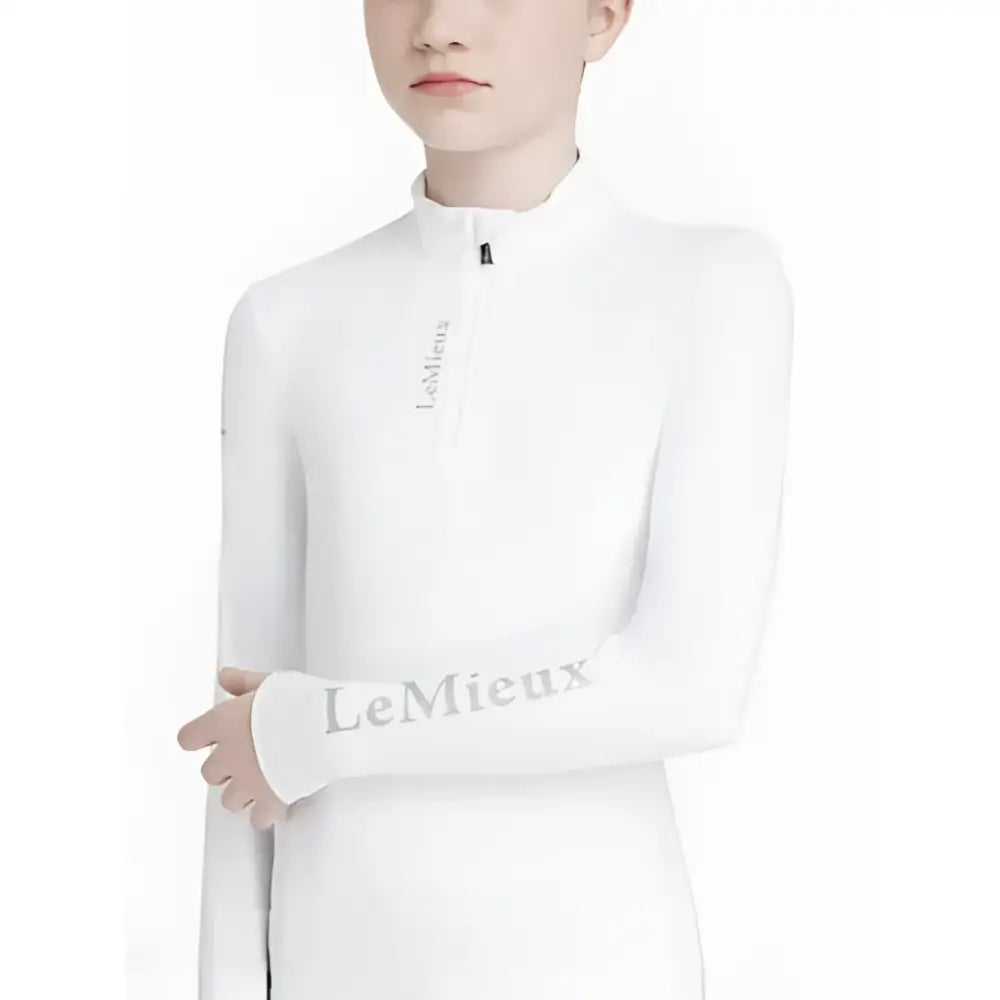 White lemieux young rider classique base layer long-sleeved performance top with subtle gray branding on chest and sleeve