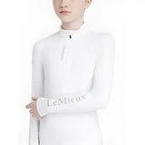 White lemieux young rider classique base layer long-sleeved performance top with subtle gray branding on chest and sleeve