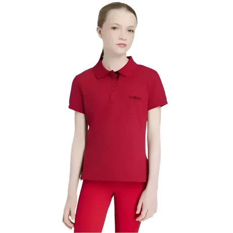 Red short-sleeved lemieux young rider classique polo shirt in chilli with collar and embroidered logo on left chest