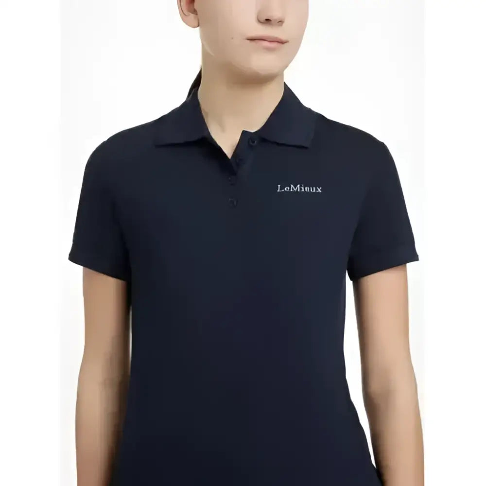 Navy polo shirt by lemieux young rider with white embroidered logo on left chest in a classic polo shirt style