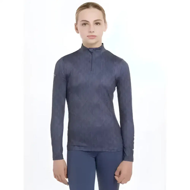 Dark blue long-sleeved lemieux young rider clea base layer with subtle geometric pattern and quarter-zip neckline