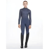 Dark blue lemieux young rider clea base layer with high collar zipper and subtle texture for comfortable riding in dusk blue