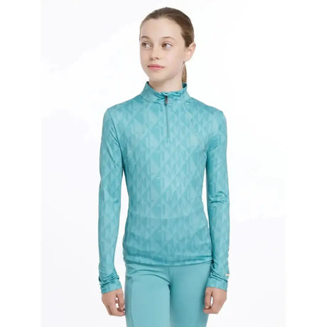 Teal lemieux young rider clea base layer with subtle geometric pattern and half zip collar perfect for riding
