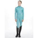 A teal lace lemieux young rider clea base layer with high collar and long sleeves perfect for riding