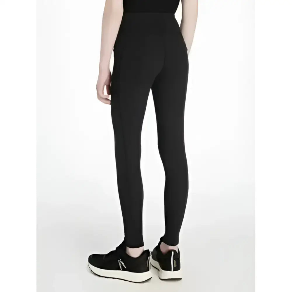 Black high-waisted lemieux young rider darla sport legging with sleek, form-fitting design perfect for riding