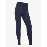 Navy blue high-waisted lemieux young rider darla sport legging with subtle white logo on the thigh in sport legging navy style