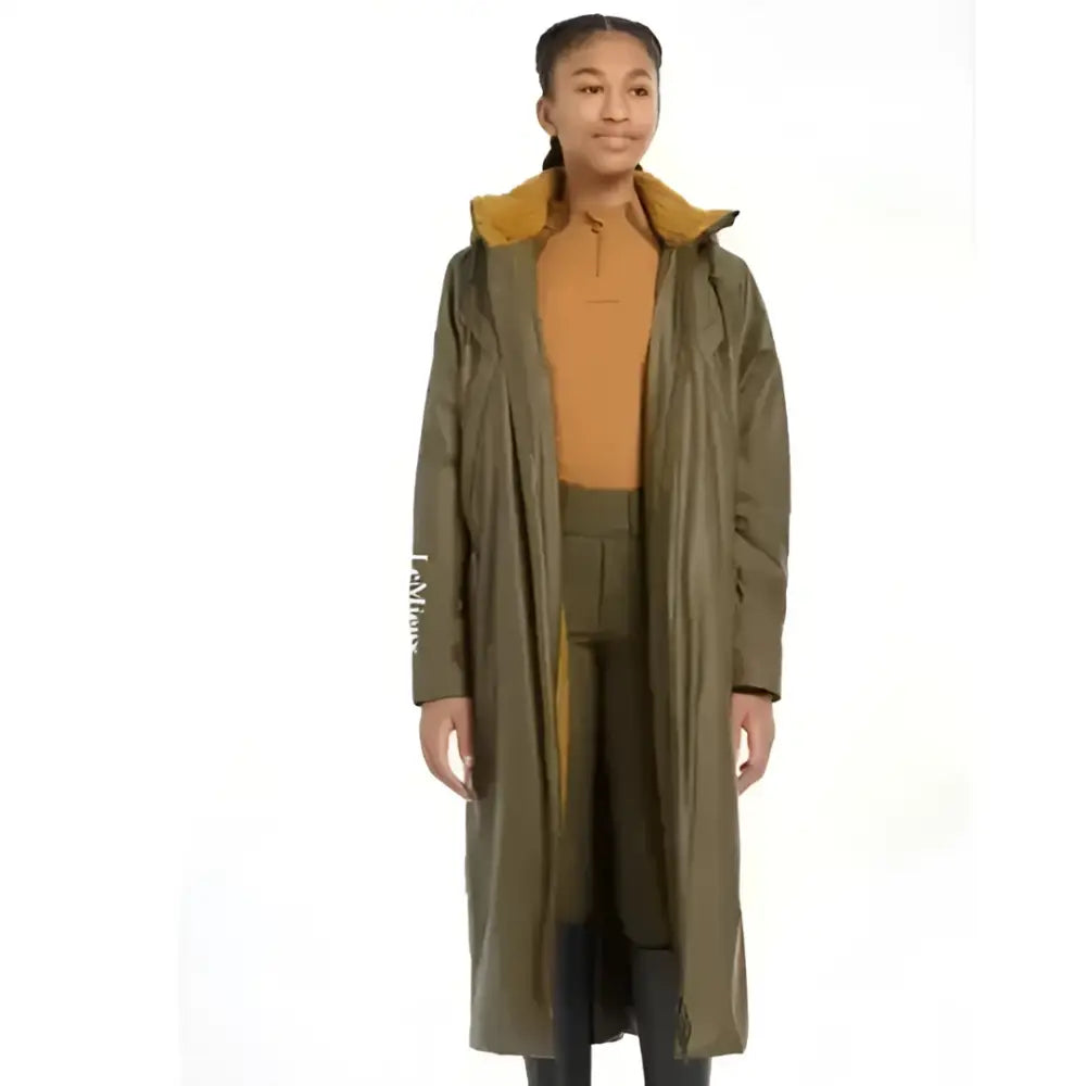 Olive green lemieux young rider trench coat alpine with contrasting mustard yellow hood and inner lining