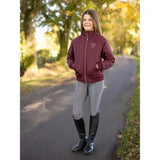 Maroon lemieux young rider elite team zip up jacket with subtle embroidered logo on chest for riding use