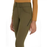 Olive green lemieux young rider ella winter breggings with fitted waistband and zippered side pockets for riding