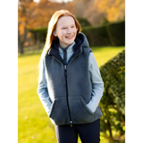 Smiling young woman in Lemieux Young Rider Eloise Reversible Winter Gilet Navy