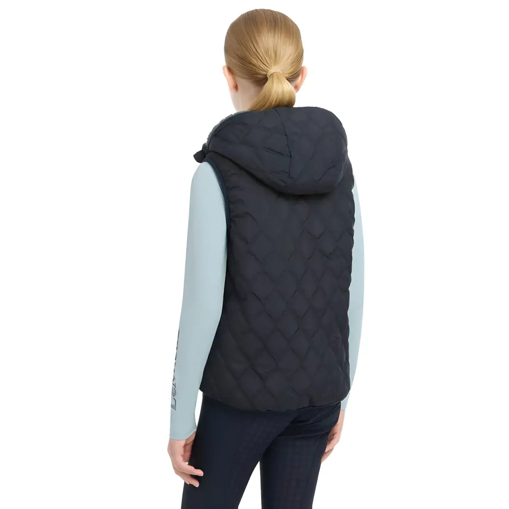 Quilted navy blue hooded vest with light blue undershirt from Lemieux Young Rider Eloise