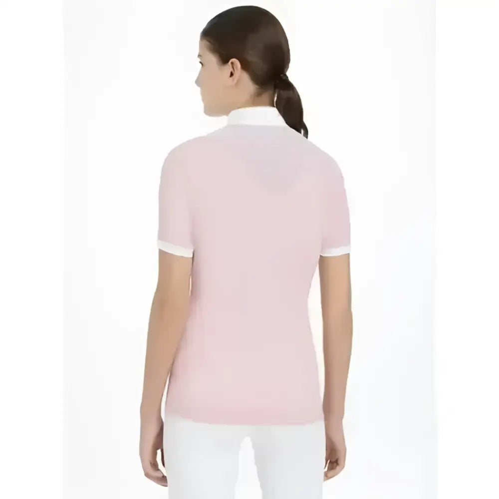 A soft pink lemieux young rider eva short sleeve polo shirt with a white collar and sleeve trim perfect for riders