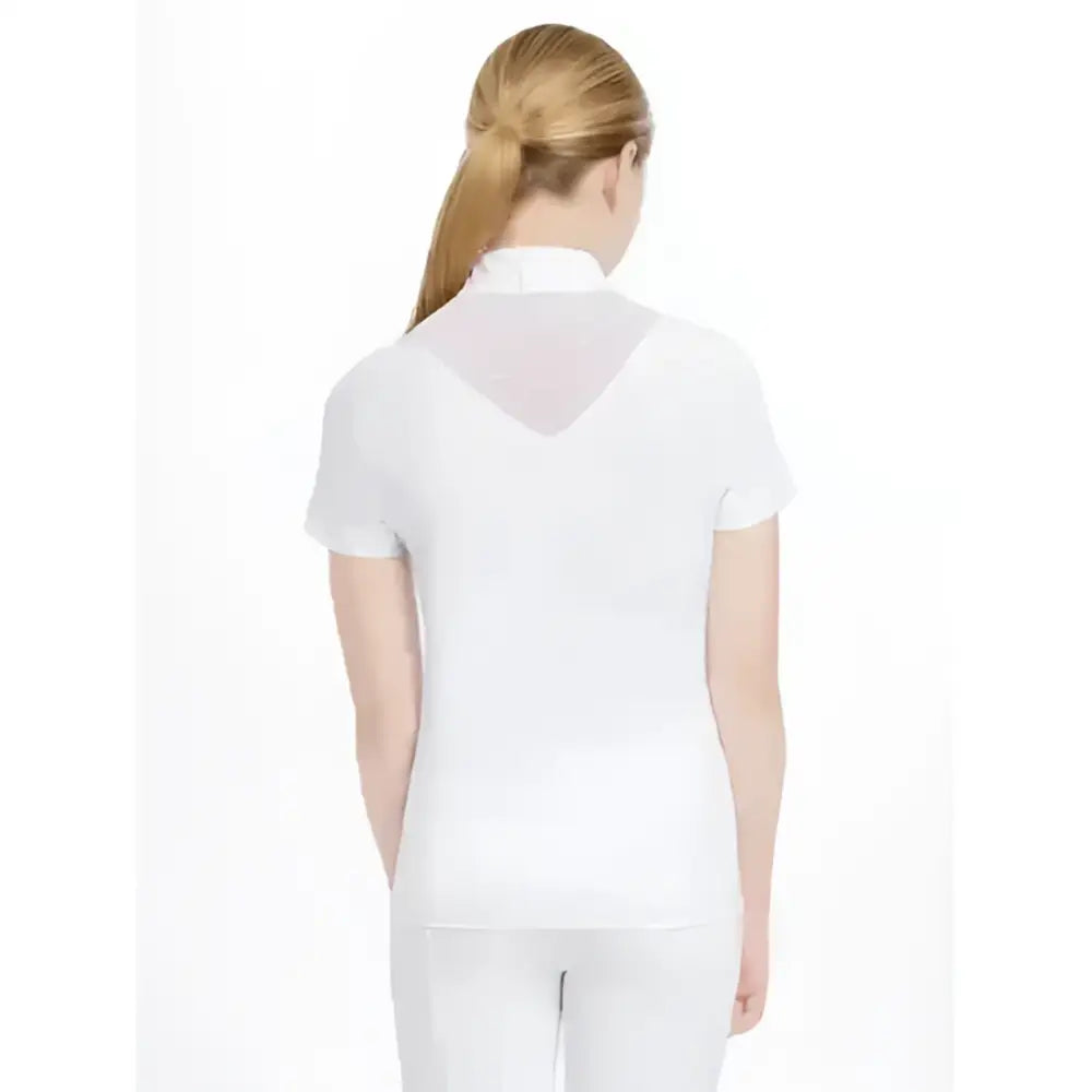 Back view of lemieux young rider eva short sleeve polo shirt in white with sheer mesh panel at the neckline