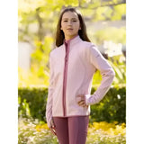 A soft pink lemieux young rider felicity fleece zip through jacket with long sleeves and subtle upper sleeve branding