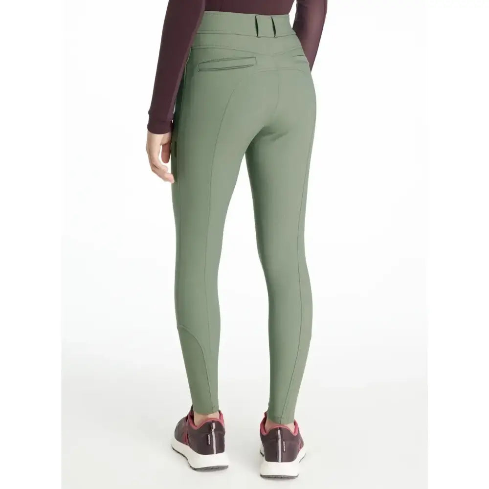 Olive green lemieux young rider seat izzy breeches with high waist and subtle seam detailing for young riders