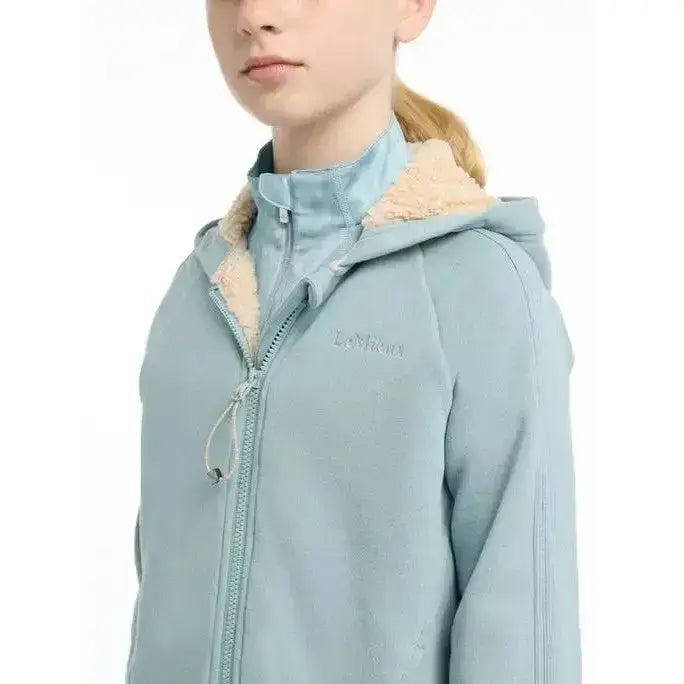 Light blue lemieux young rider hollie lined hoodie with soft beige fleece lining and subtle chest embroidery