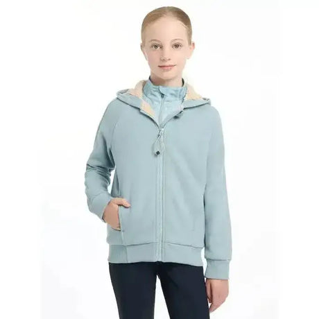 Light blue lemieux young rider hollie lined hoodie with beige inner lining and ribbed cuffs for comfy riding