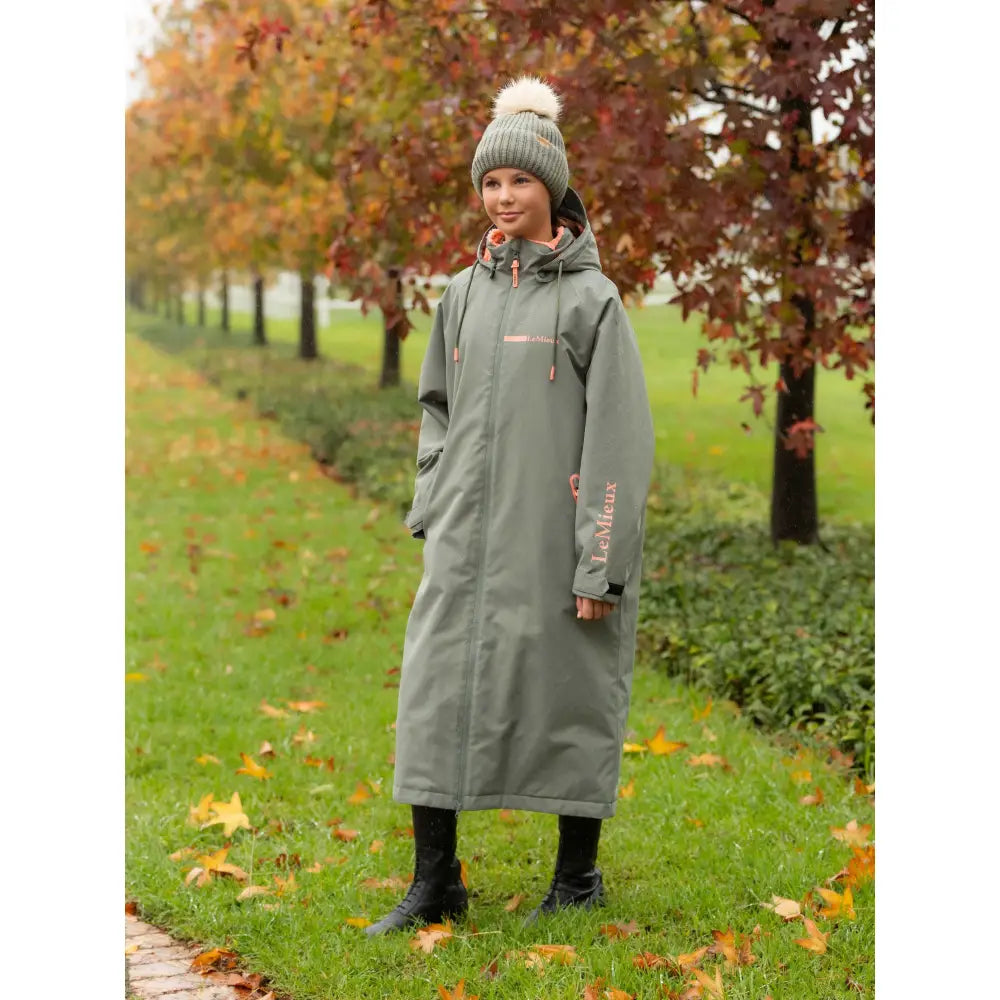 Olive green lemieux young rider hydroshield robe rosemary with pink zipper pulls and breathable waterproof fabric