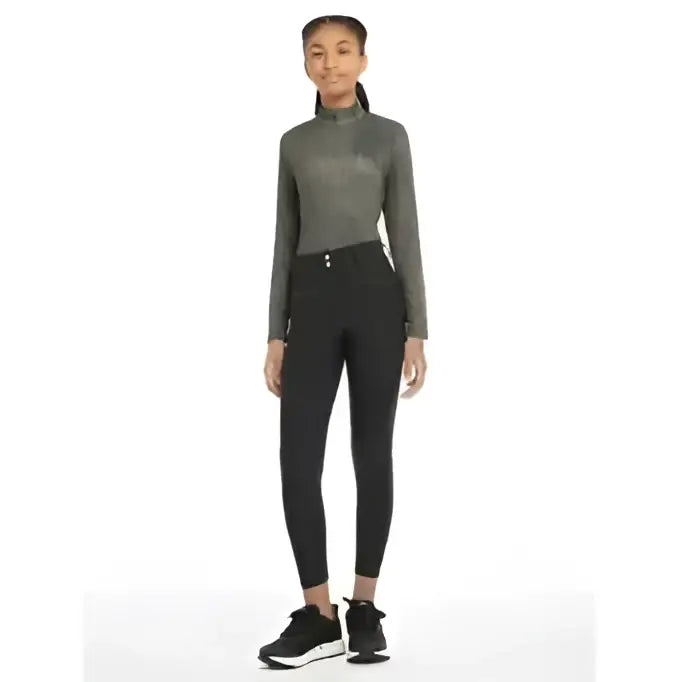 A sleek dark gray high neck long sleeve top with subtle texture paired with lemieux young rider izzy seat breeches navy