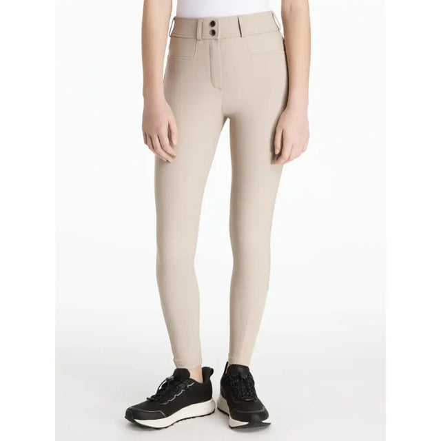 Beige lemieux young rider izzy knee grip breeches almond with fitted silhouette high waistband and black button details