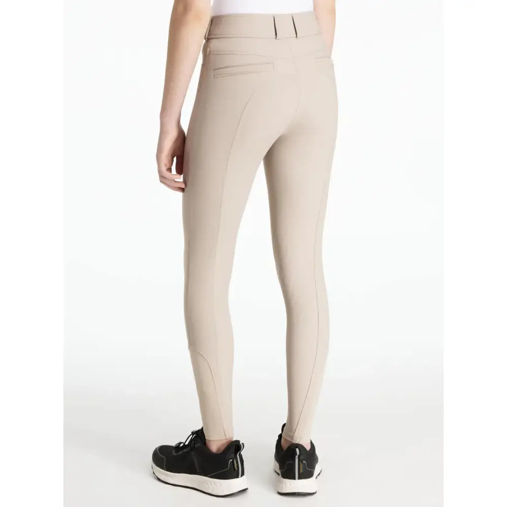 Beige lemieux young rider izzy knee grip breeches almond with high waist and sleek form-fitting design