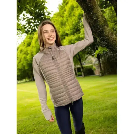 A light gray quilted puffer vest with full zipper and long sleeves from lemieux young rider josephine jacket pecan collection