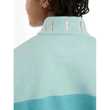 Light blue and teal color-blocked lemieux young rider kate quarter zip sweat lagoon with high collar and embroidered lettering