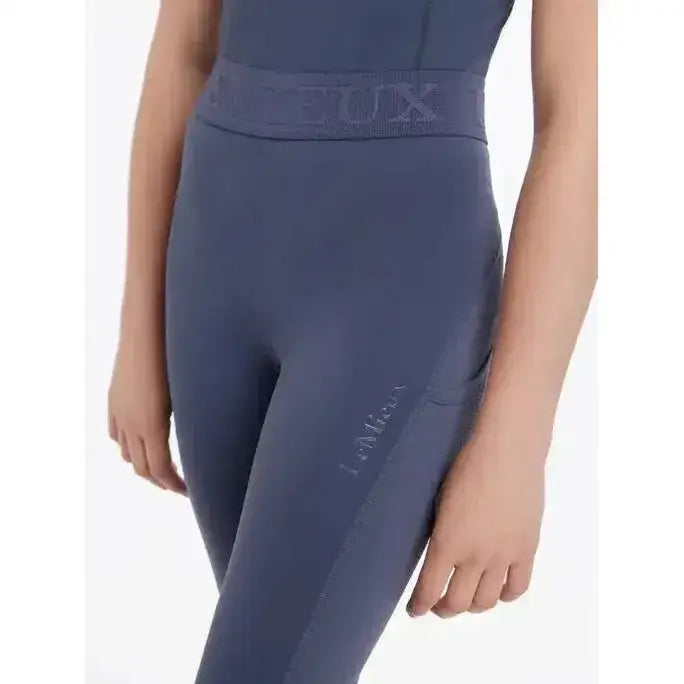Navy blue high waisted lemieux young rider lizzie mesh legging with subtle branding on waistband and thigh