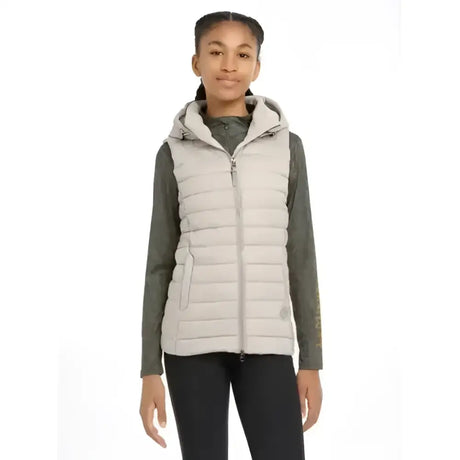 Light gray quilted hooded vest with front zipper and side pockets from lemieux young rider milly puffer collection