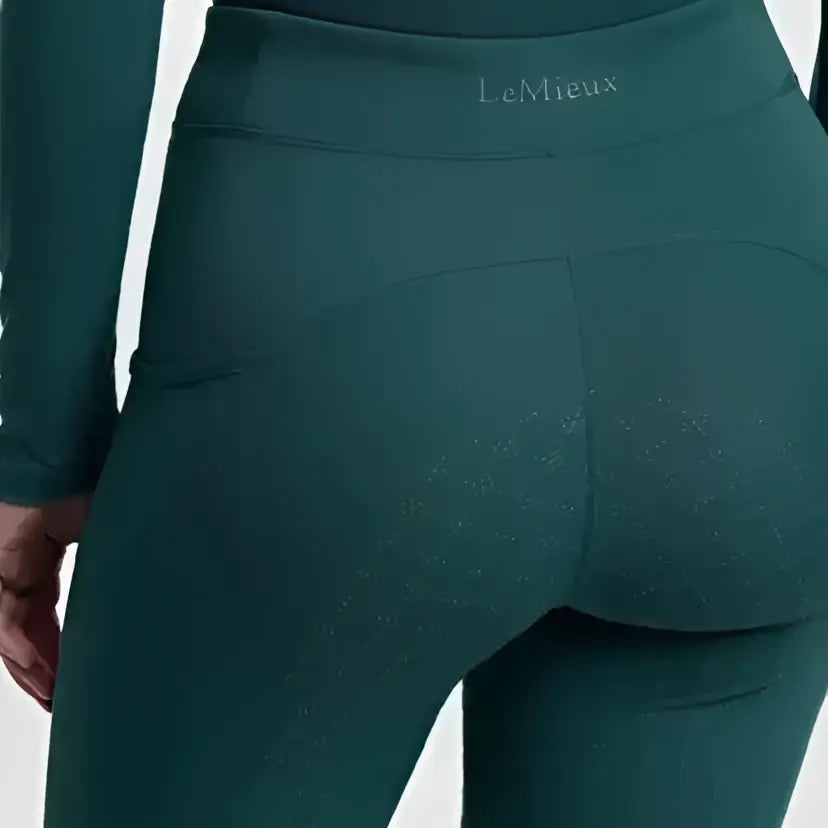 Dark green lemieux young rider breech jungle with perforated detailing and branded waistband for riders cool style