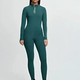 A sleek dark green lemieux young rider long-sleeved jumpsuit with quarter-zip and subtle side breech jungle branding