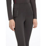 Black lemieux young rider orla pull ons cinder riding pants with sleek fit and subtle red accent stitching on waistband