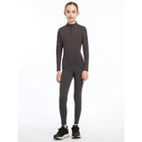 A sleek dark gray lemieux young rider orla pull ons bodysuit with maroon accents designed for young riders