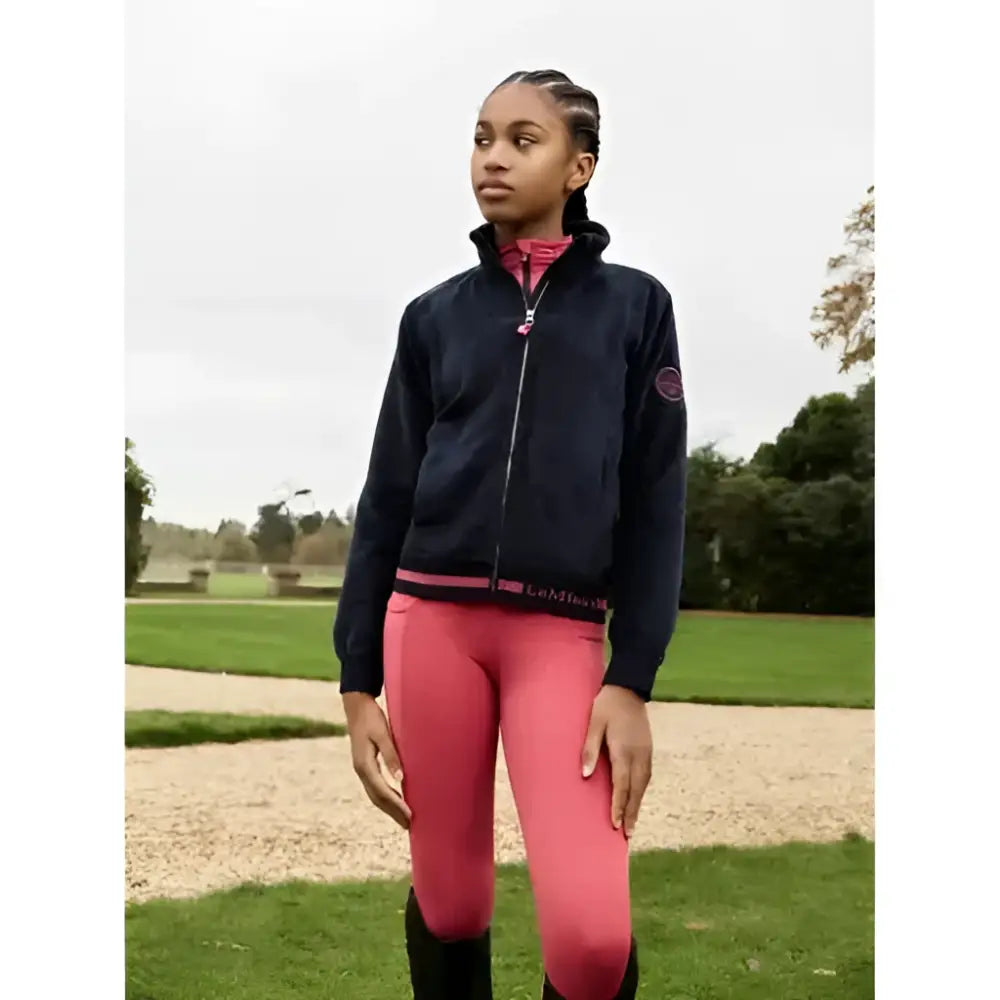 Navy blue lemieux young rider zip-up jacket with pink accents and subtle logo on sleeve in orla pull ons cranberry style