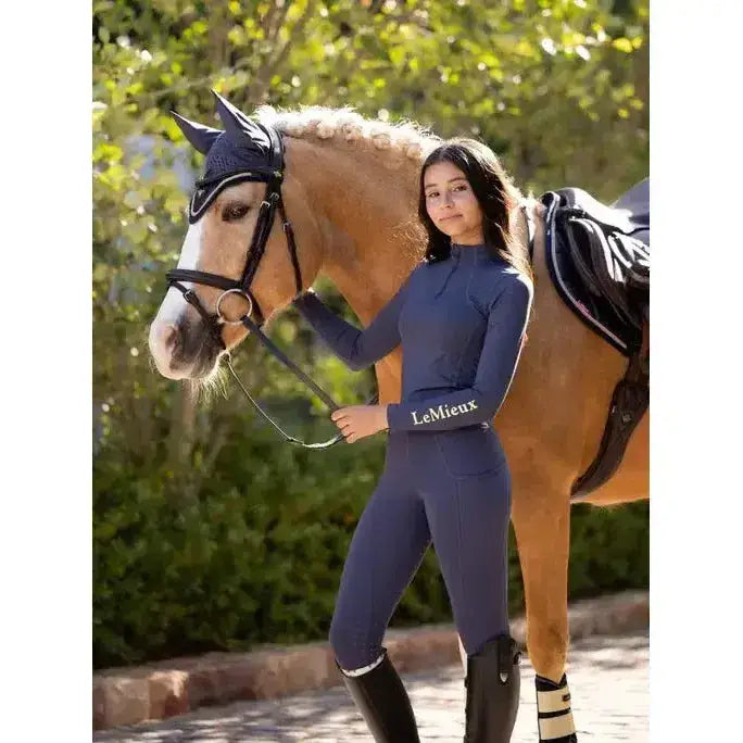 Navy blue lemieux young rider orla pull ons with long sleeves and leggings perfect for equestrian riding