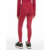 Red high-waisted leggings with a sleek fit from lemieux young rider orla pull ons in ember color