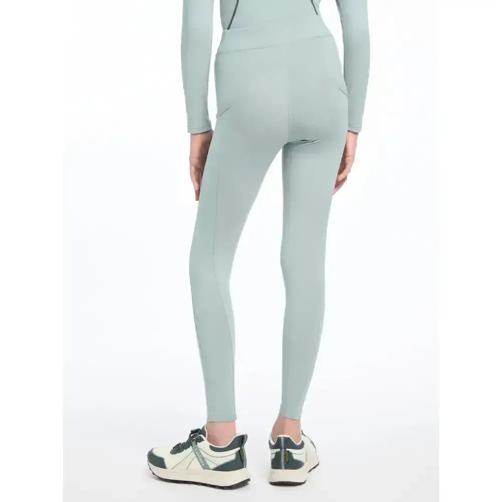 A sleek light green lemieux young rider orla pull ons set with high waist smooth fabric and subtle side seams