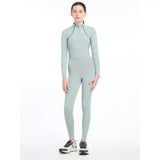A sleek light gray lemieux young rider orla pull ons bodysuit with black zipper accents and seam detailing