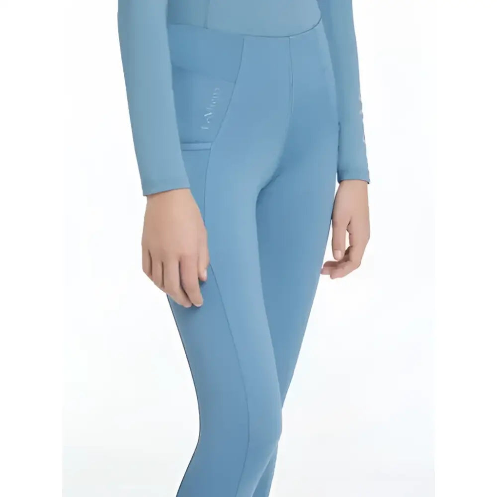 Light blue lemieux young rider orla pull ons ice leggings with subtle seam detail and branded thigh pocket