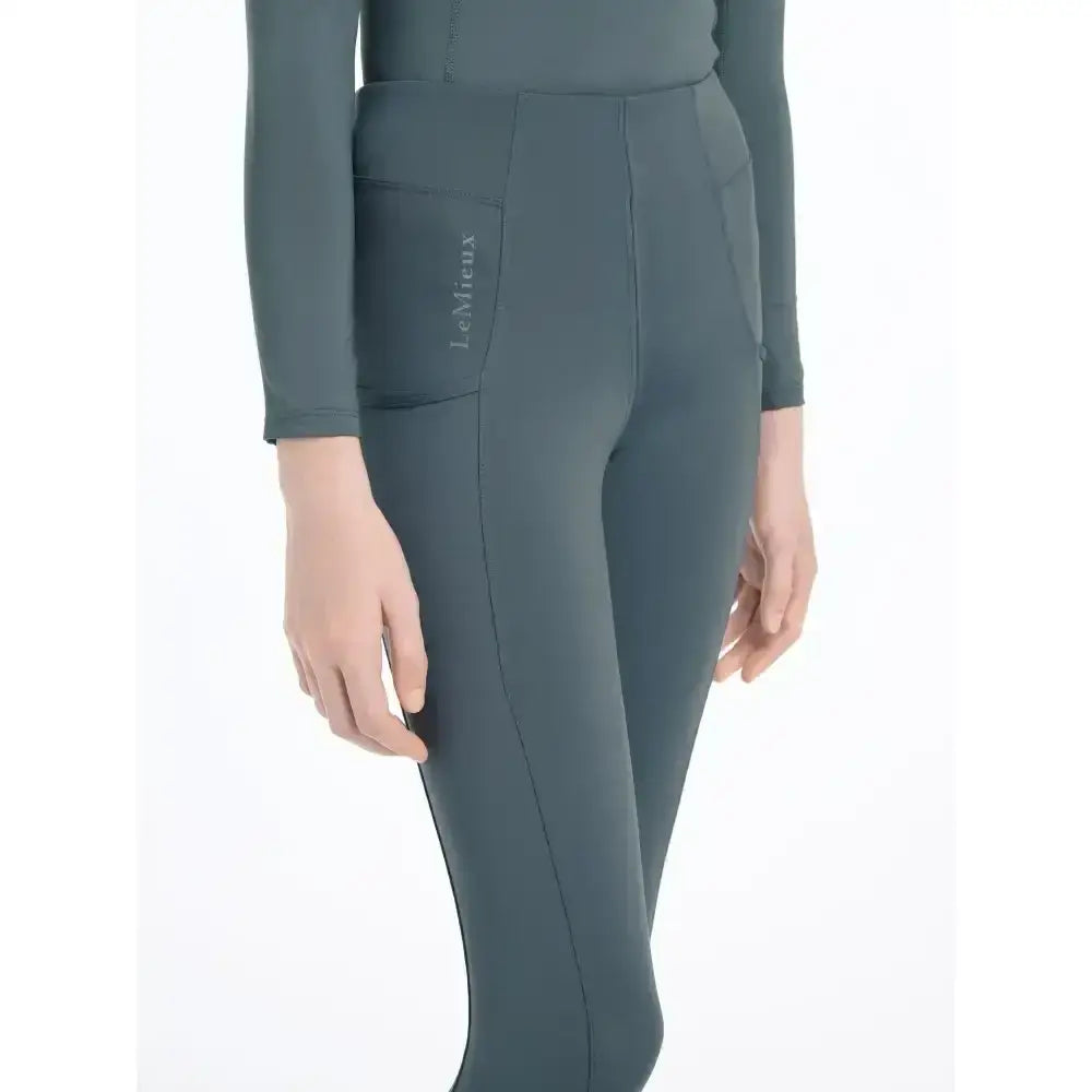 Dark gray lemieux young rider orla pull ons with subtle seam and embroidered brand name on side pocket