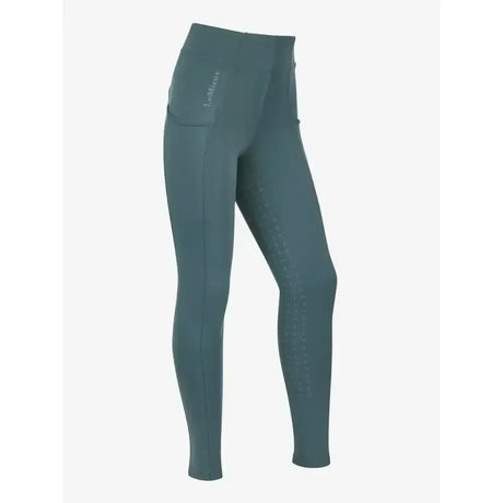 Dark teal lemieux young rider orla pull ons leggings with subtle thigh perforations and small logo near waistband