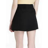 Black lemieux young rider penelope shorts with high waisted pleated waistband and flared hem for riding comfort