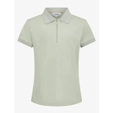 A light green lemieux young rider polo shirt pistachio with a chest logo and zipper collar perfect for young riders