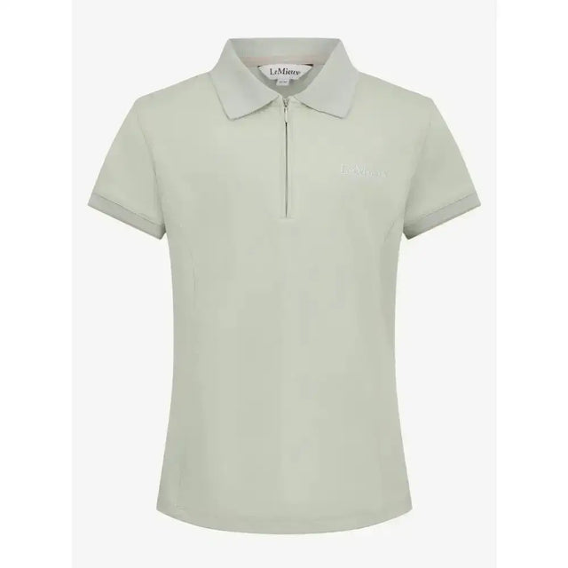 A light green lemieux young rider polo shirt pistachio with a chest logo and zipper collar perfect for young riders