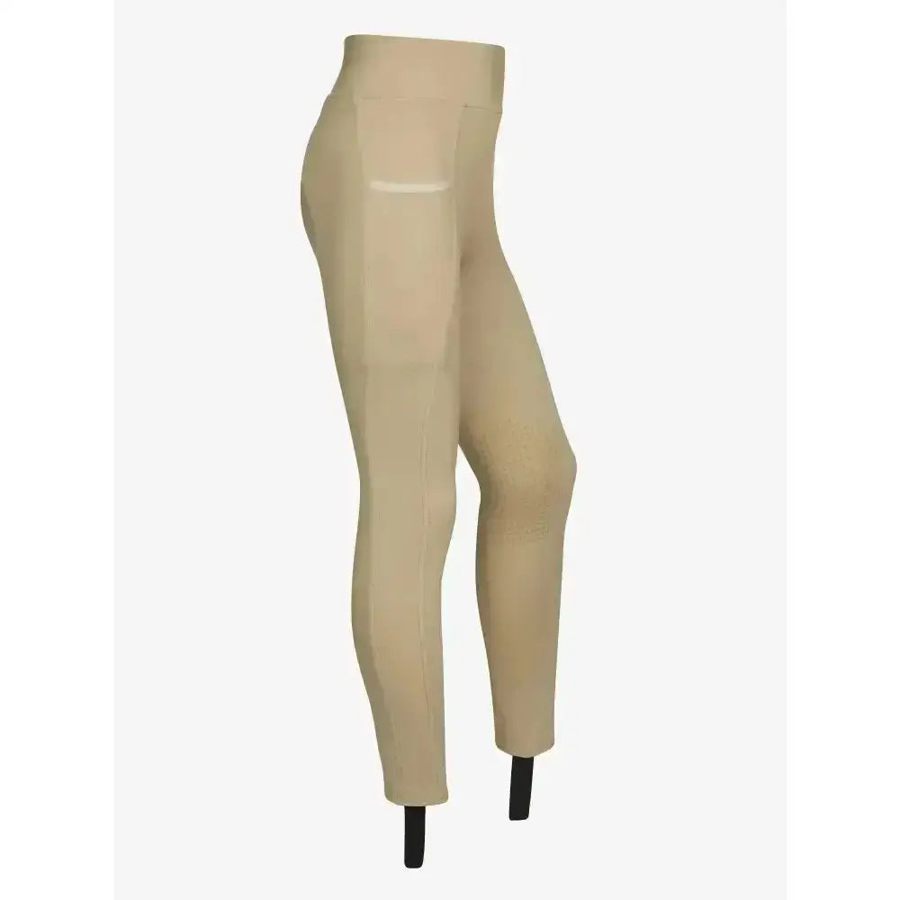 Beige lemieux young rider pull on breeches with sweat wicking 4-way stretch fabric and a sleek high-waisted fit