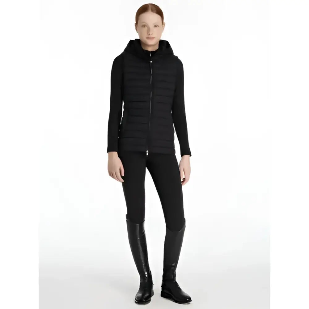 Black quilted hooded vest with long sleeves and front zipper lemieux young rider ruby gilet black for riding